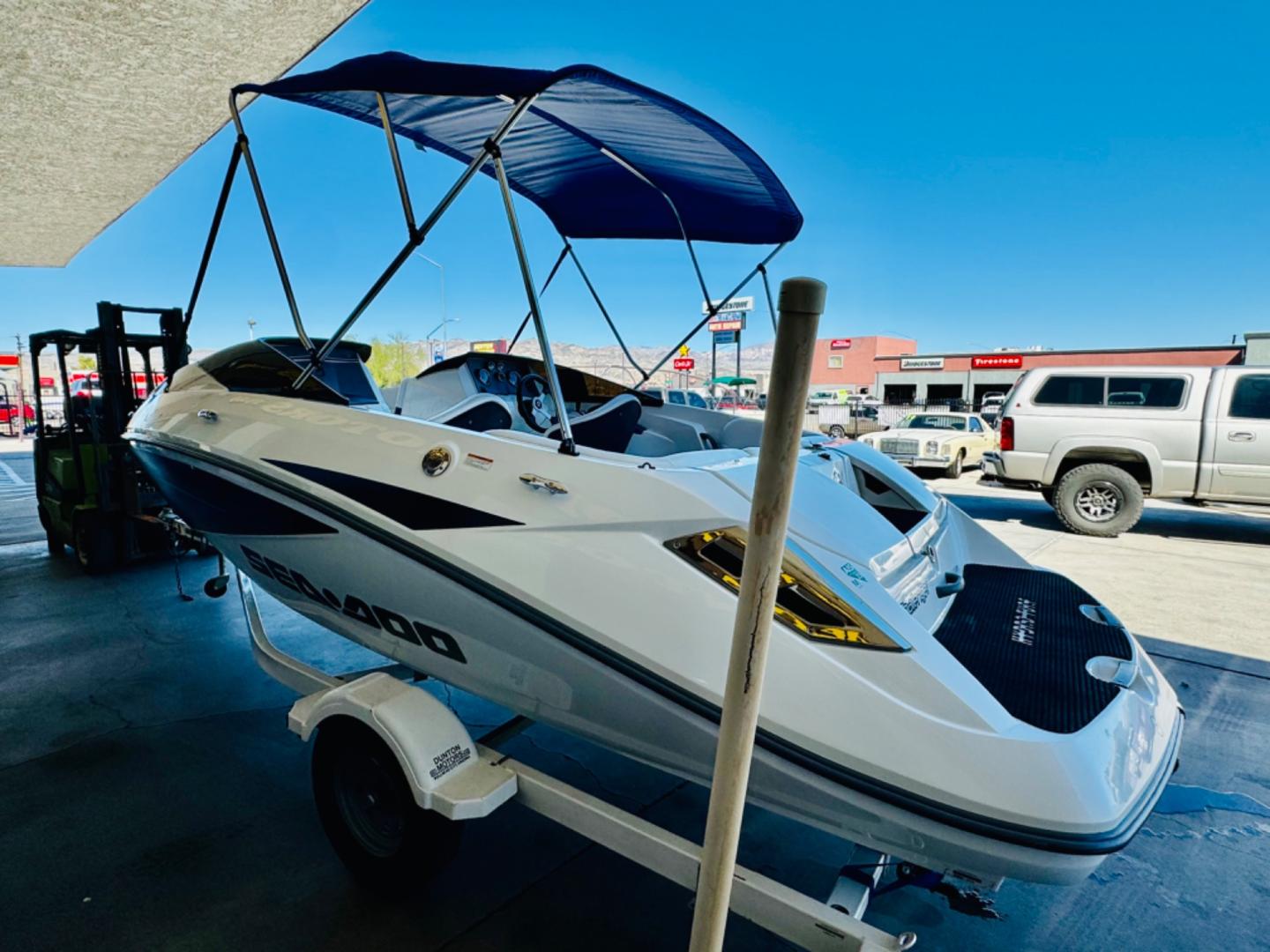 2005 White /white/blue Sea Doo Challenger , located at 2190 Hwy 95, Bullhead City, AZ, 86442, (928) 704-0060, 0.000000, 0.000000 - on consignment. super clean 2006 sea doo challenger. new bimini top. new stereo. recentl serviced. Runs great. Free and clear title. Only 84 hours on engine . - Photo#0